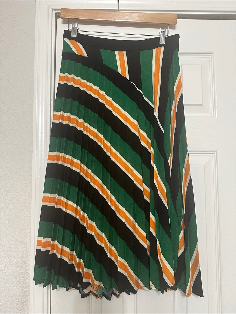 Chloe Dao Striped Pleated Midi Skirt in Green, Black & Orange
